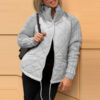 e2a58be4-ba18-4564-824a-0bec038aa95e.jpg Winter Stand Collar Cotton Jacket With Pockets Fashion Knitted Stitching Zipper Coat Warm Tops For Women Clothing